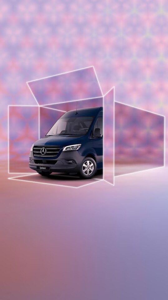 The Mercedes-Benz Vito Tourer is parked in front of a glass building.
